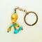 Handmade orange coral and turquoise beaded keychain with copper ring, shown on neutral background.